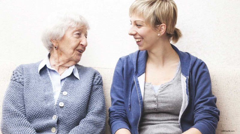 Caregiver supporting an elderly family member